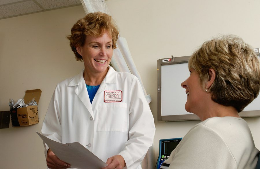 Clinician speaking with a patient